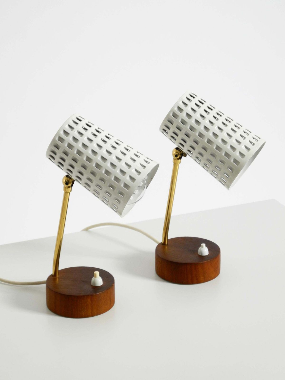 photo furniture A Pair Of Beautiful Mid Century Modern Bedside Lamps With Perforated Metal Shade