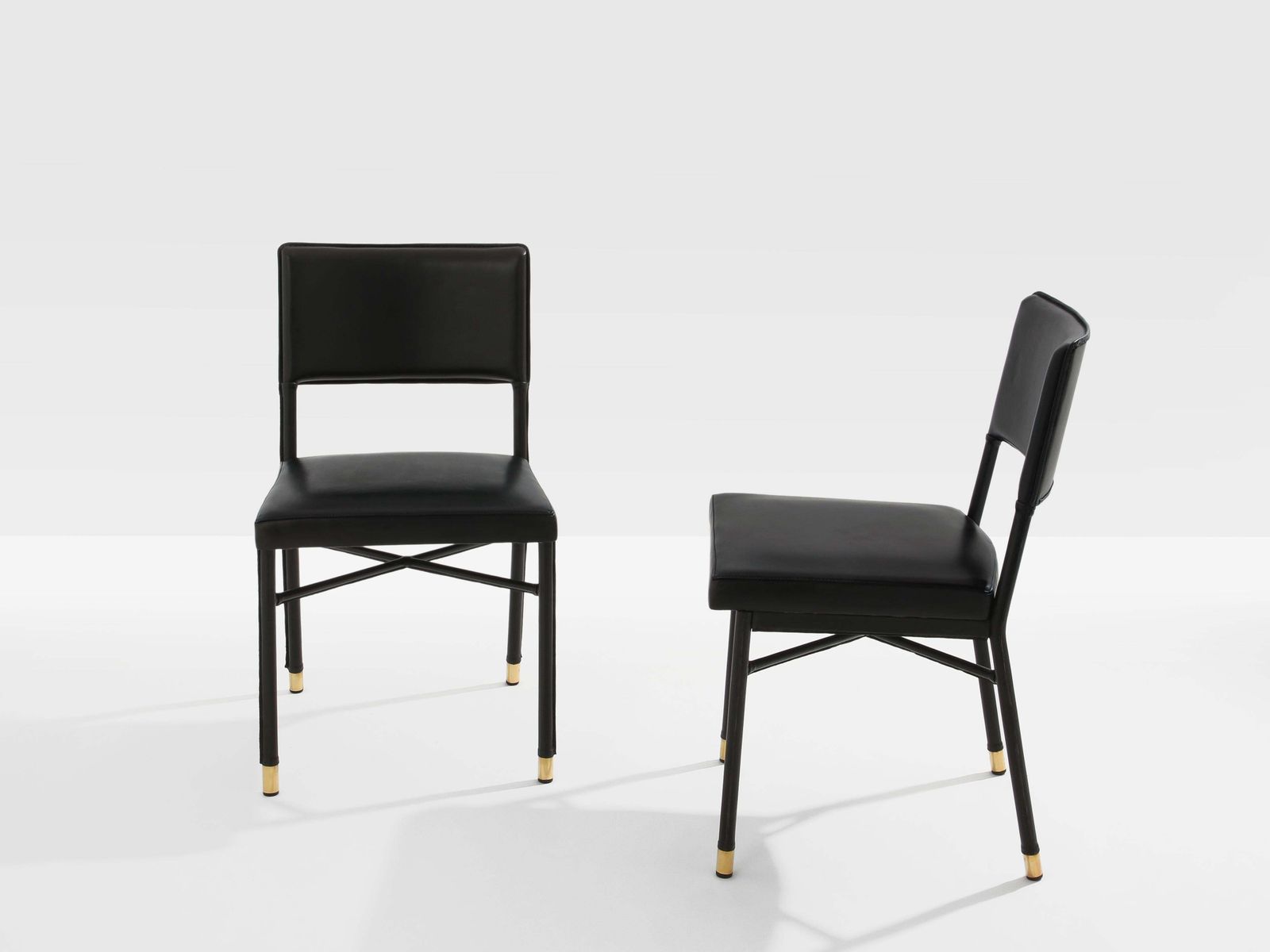 Paire de chaises Jacques Quinet en cuir sellier et laiton, 1950 photo for sale