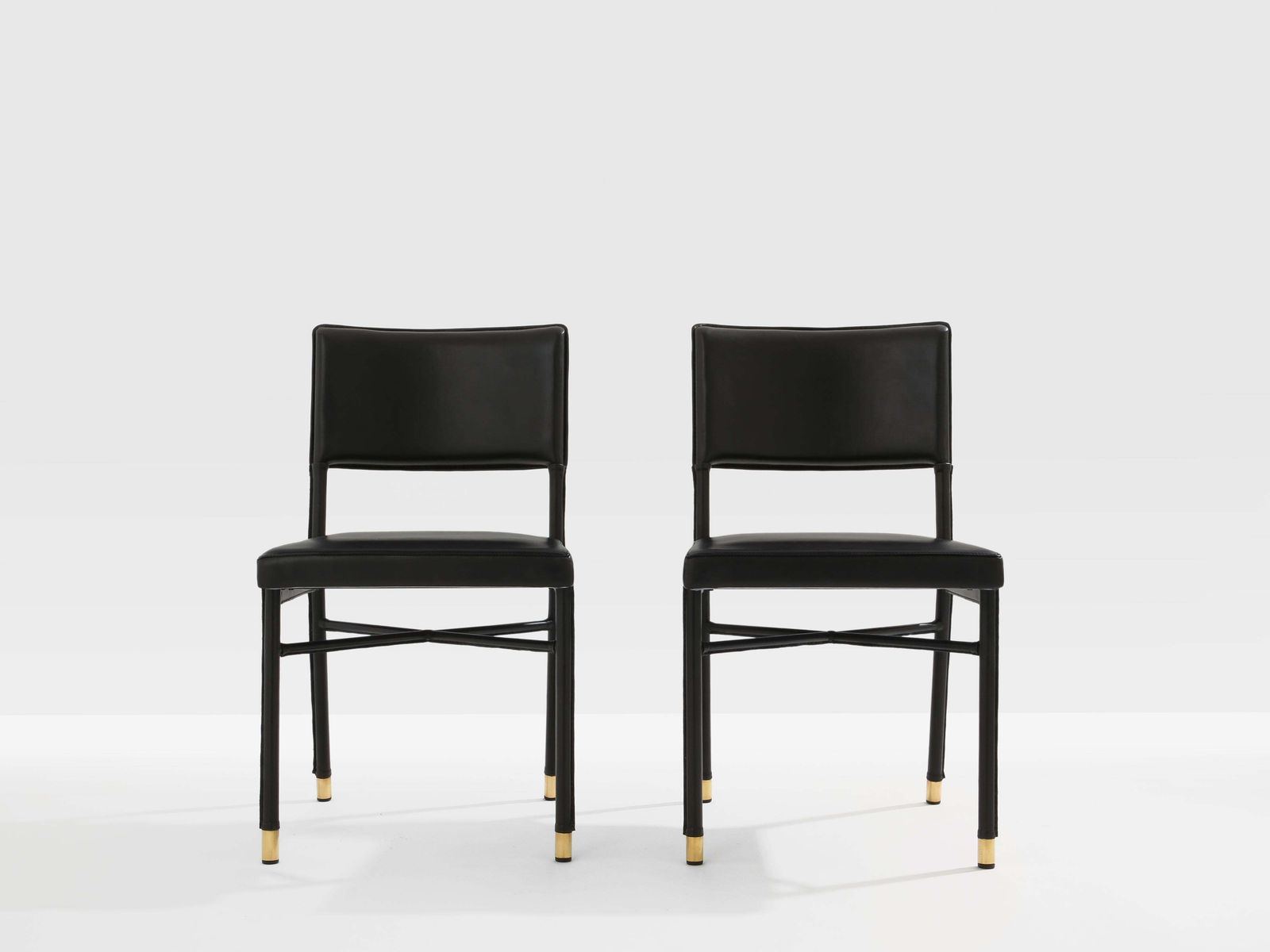 photo furniture Jacques Quinet Pair Of Saddle Stitched Leather Brass Side Chairs 1950