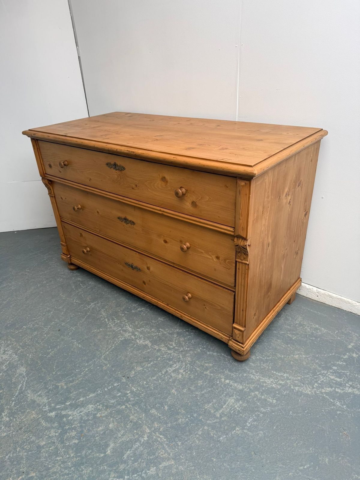A Low Wide Pine Hungarian Victorian Waxed 3 Drawer Chest Of Drawers