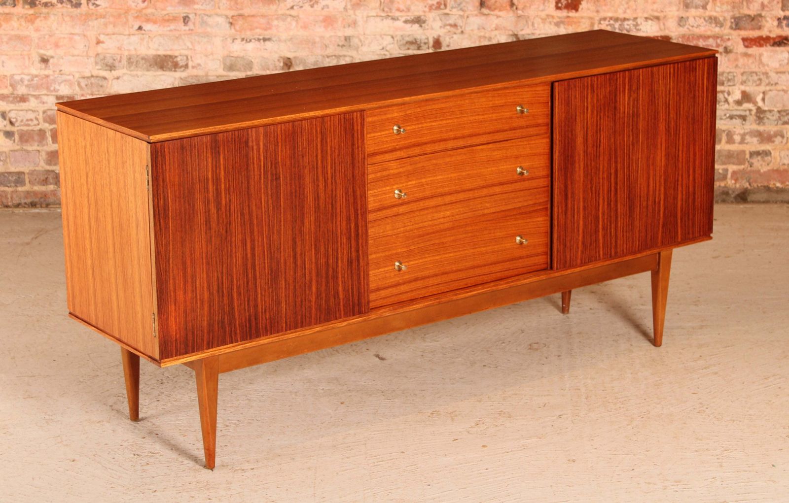 Mid Century Teak And Rosewood Sideboard With Brass Handles By Wrighton, Circa 1960s photo for sale