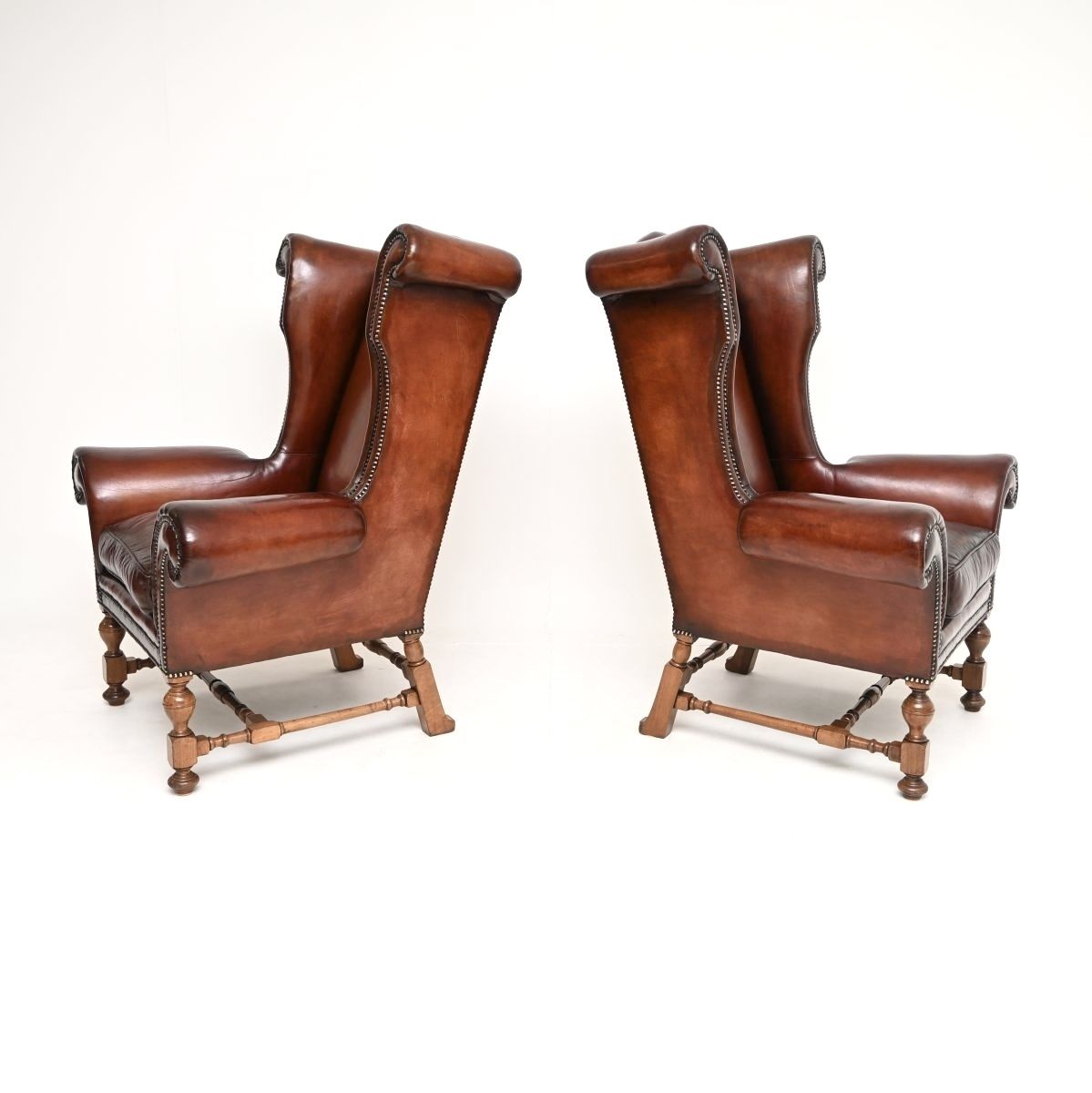 Pair Of Antique Leather Wing Back Armchairs photo Furniture