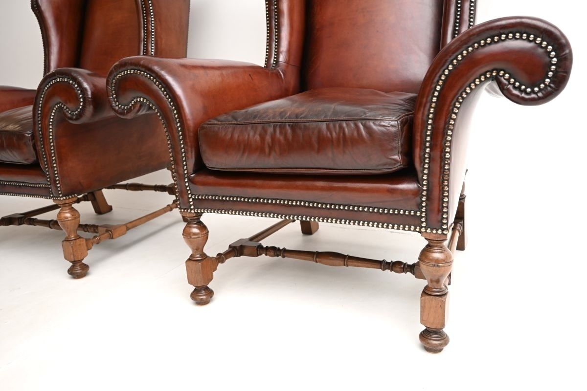 Pair Of Antique Leather Wing Back Armchairs photo vintage