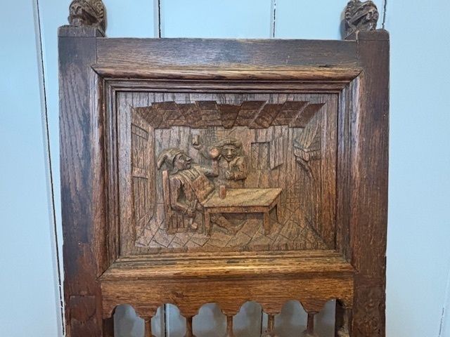 Oak Chair With Canework Seat And Carved Tavern Scene Of Back Panel photo for sale