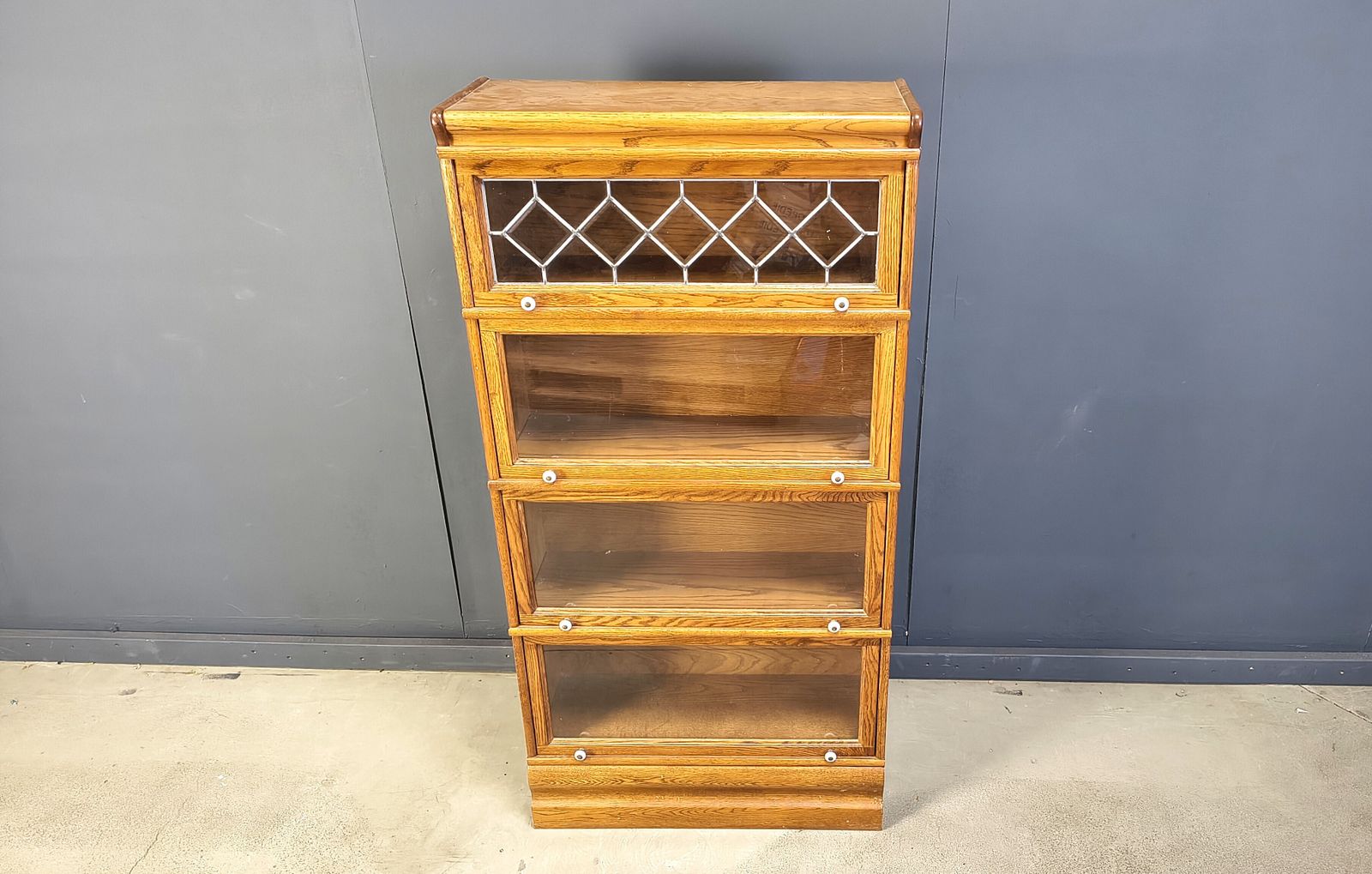 Four Tier Oak Barrister Style Bookcase With Leaded Glass photo furniture