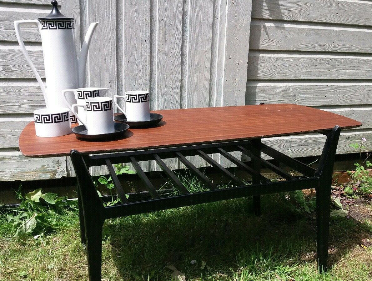 Mcm Nathan Ebonised Leg Tola Coffee Table With Magazine Rack photo vinterior