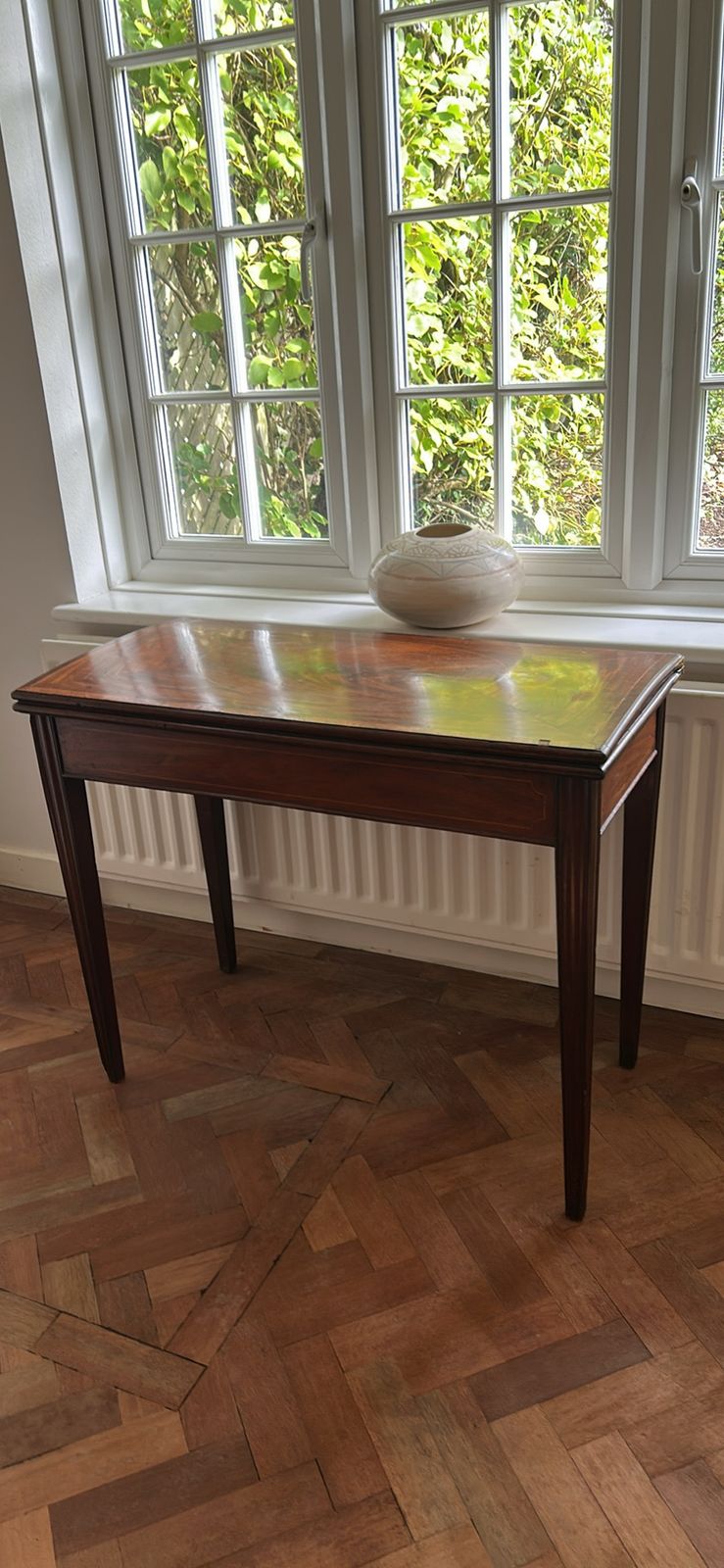 An Antique George III Mahogany Fold Over Card Or Bridge Table
