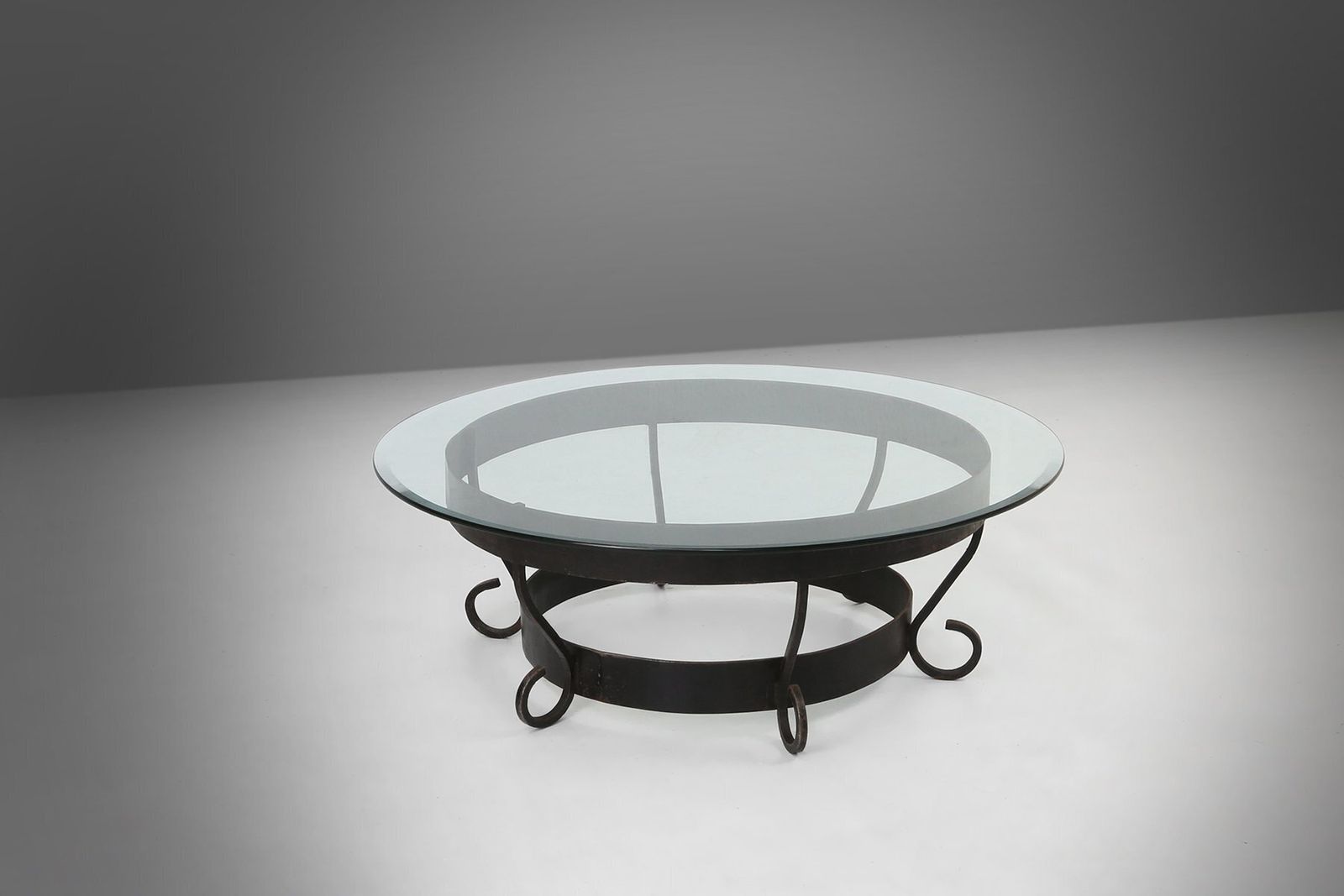 Rustic Round Coffee Table With Wrought Iron Base And Glass Top, France, 1930s photo for sale