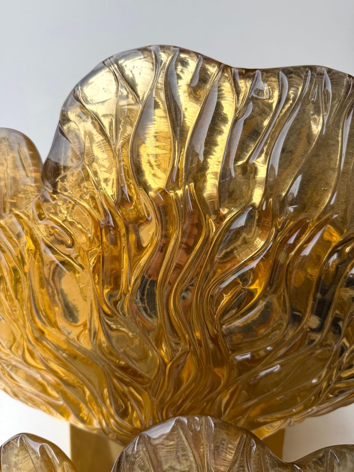 photo for sale Contemporary Pair Of Brass And Gold Murano Glass Palm Sconces, Italy
