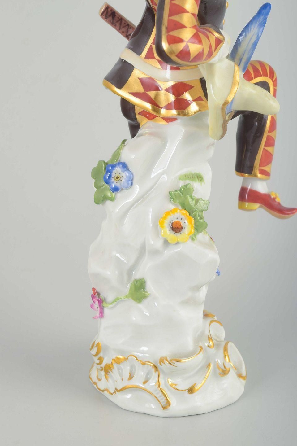 Meissen. Porcelain Figure Of “Harlequin” In A Classic Commedia Dell’arte Costume photo buy