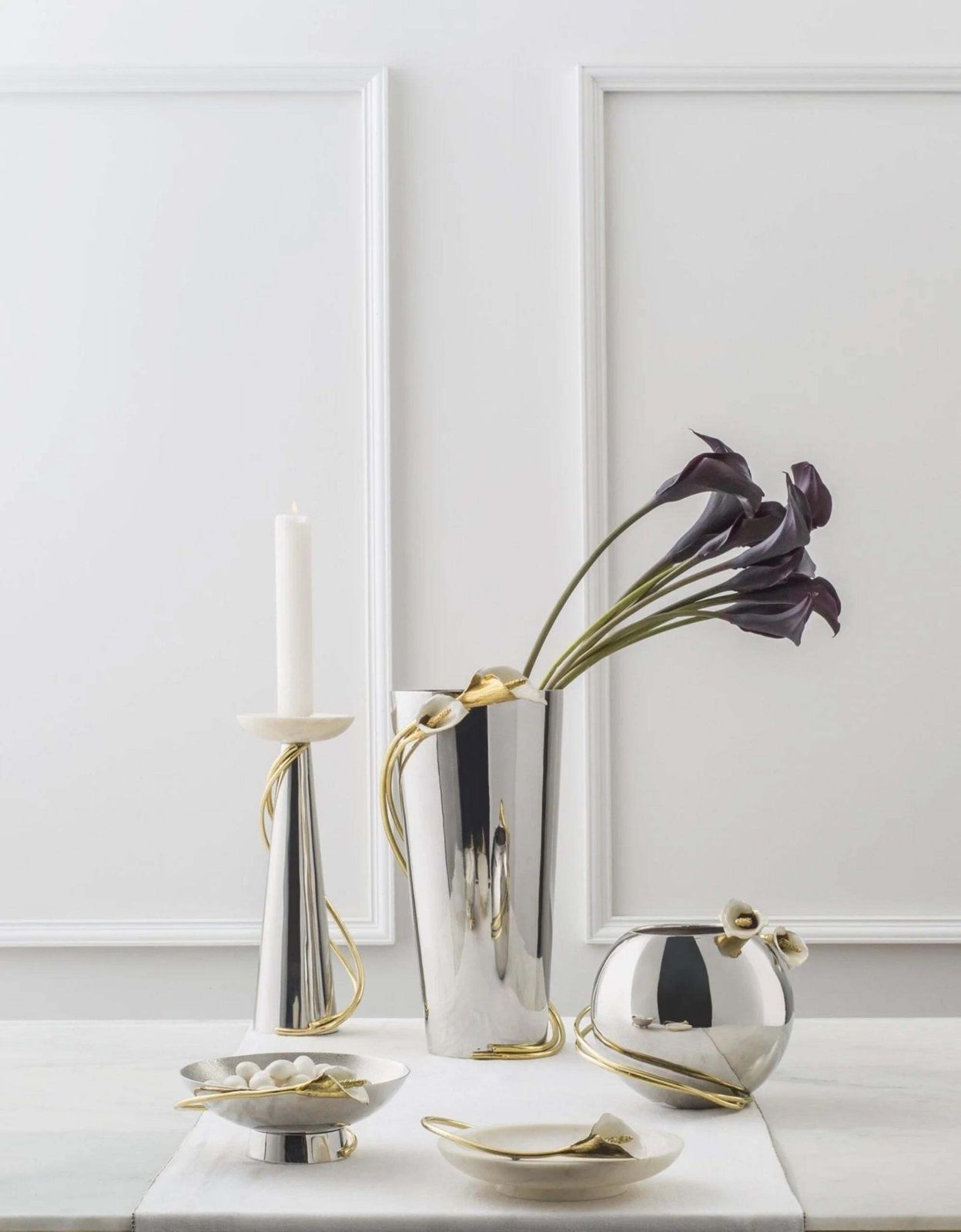 Pair Of Contemporary Silver And Gold Metal Candleholders photo for sale