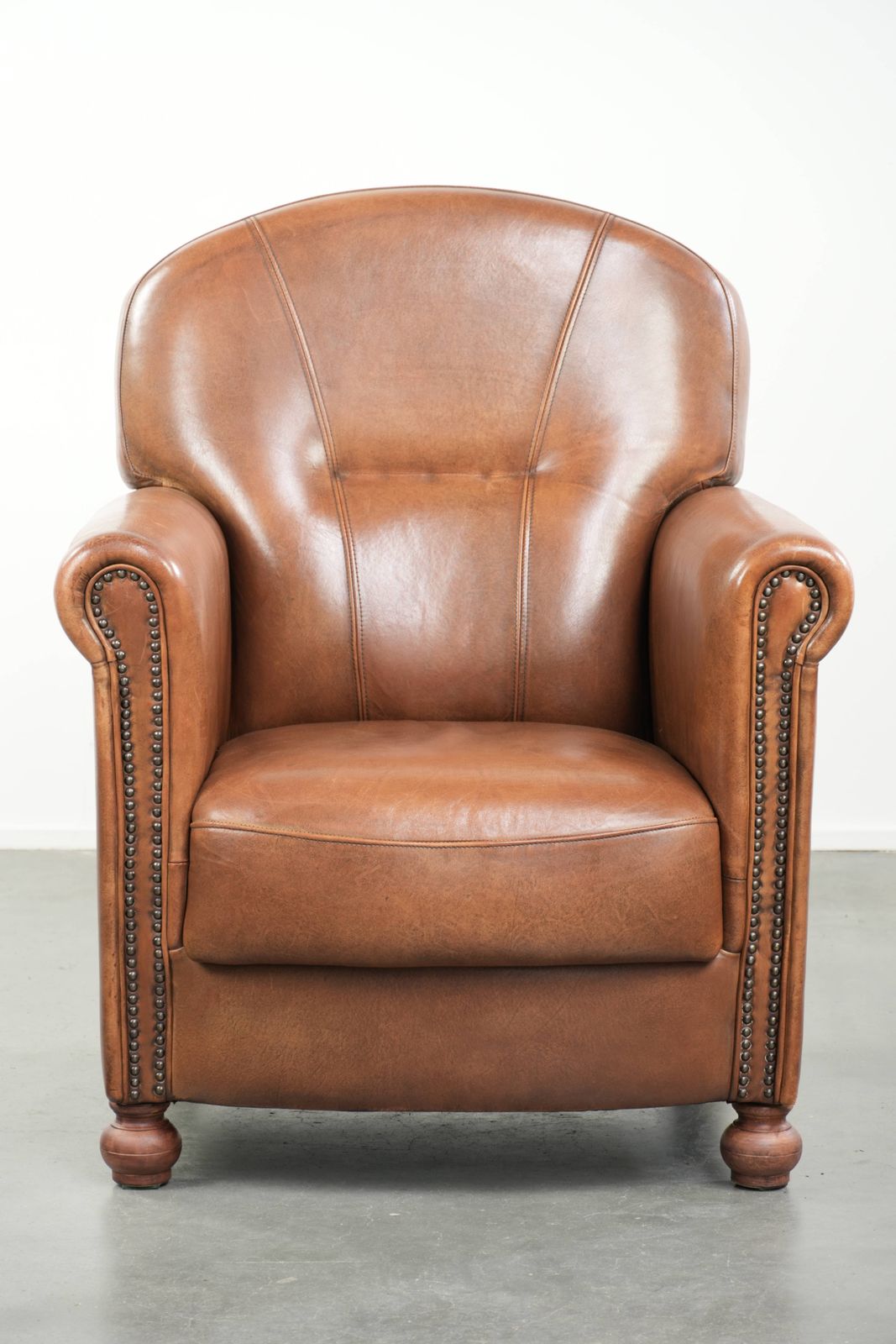 Beautiful, Stately Armchair In Good Condition, Made Of Sheepskin With A Refined Finish Featuring Decorative Nails. photo furniture