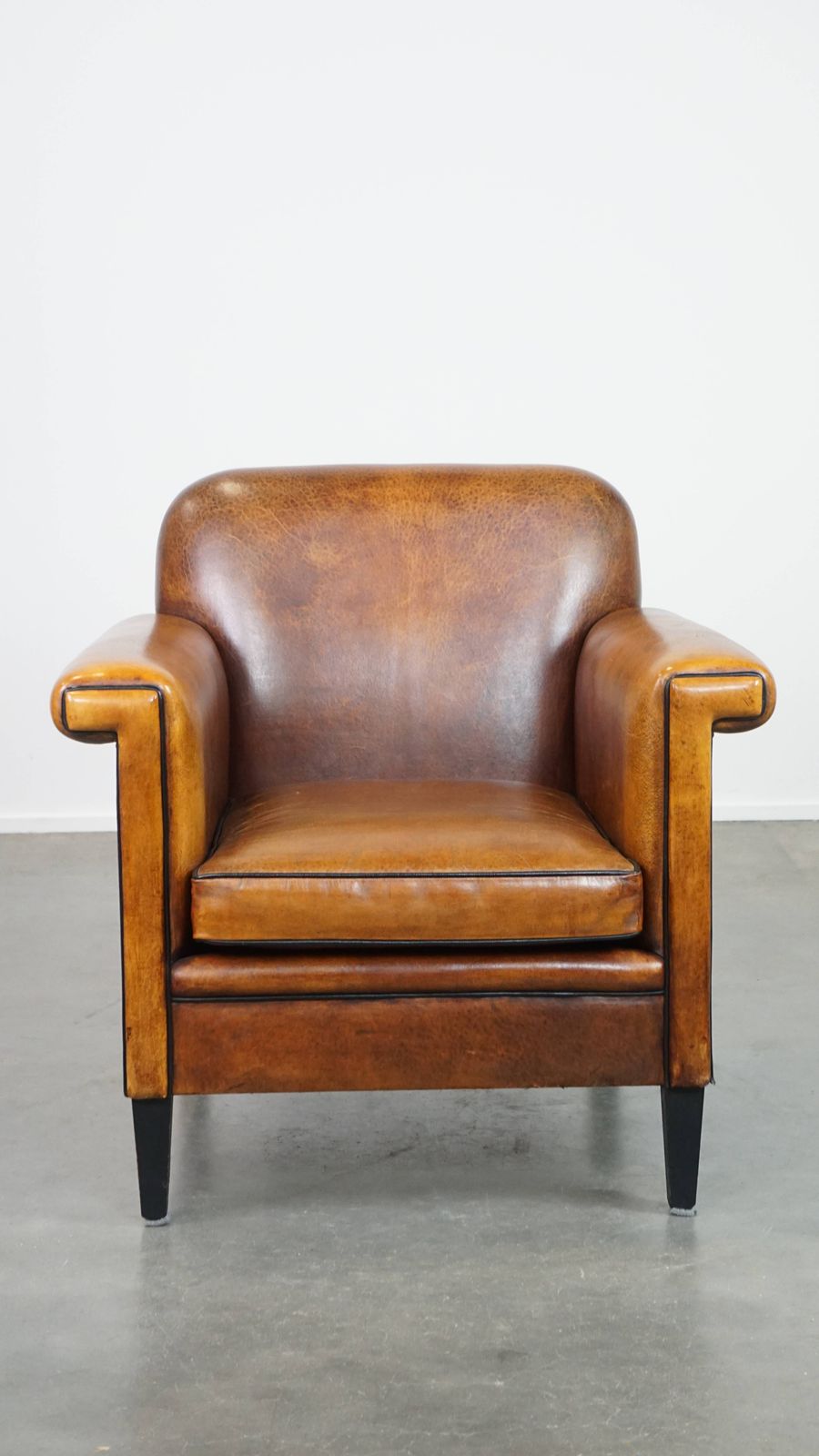 Art Deco Design Armchair In Good Condition With A Sleek Finish And Black Piping. photo furniture