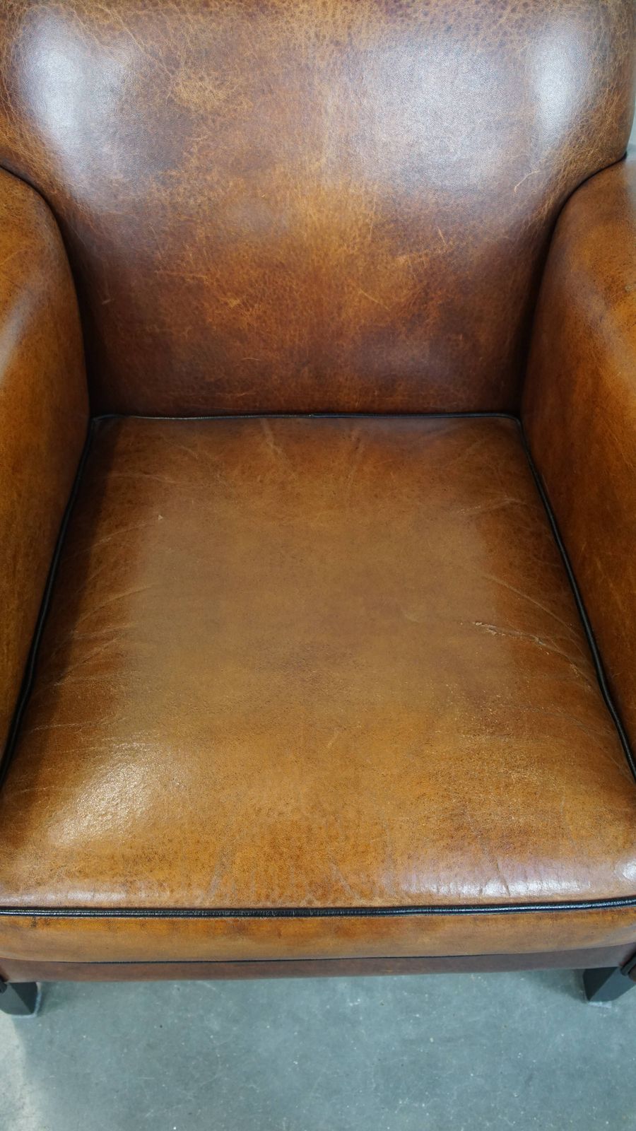 Art Deco Fauteuil In Goede Staat Met Strakke Afwerking En Zwart Bieswerk. photo for sale