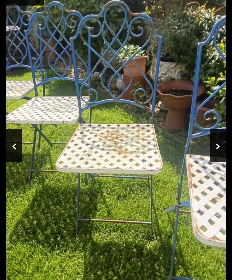 photo furniture Vintage Set Of 4 French Folding Bistro Chairs With French Wrought Iron Marble Top Side Table.