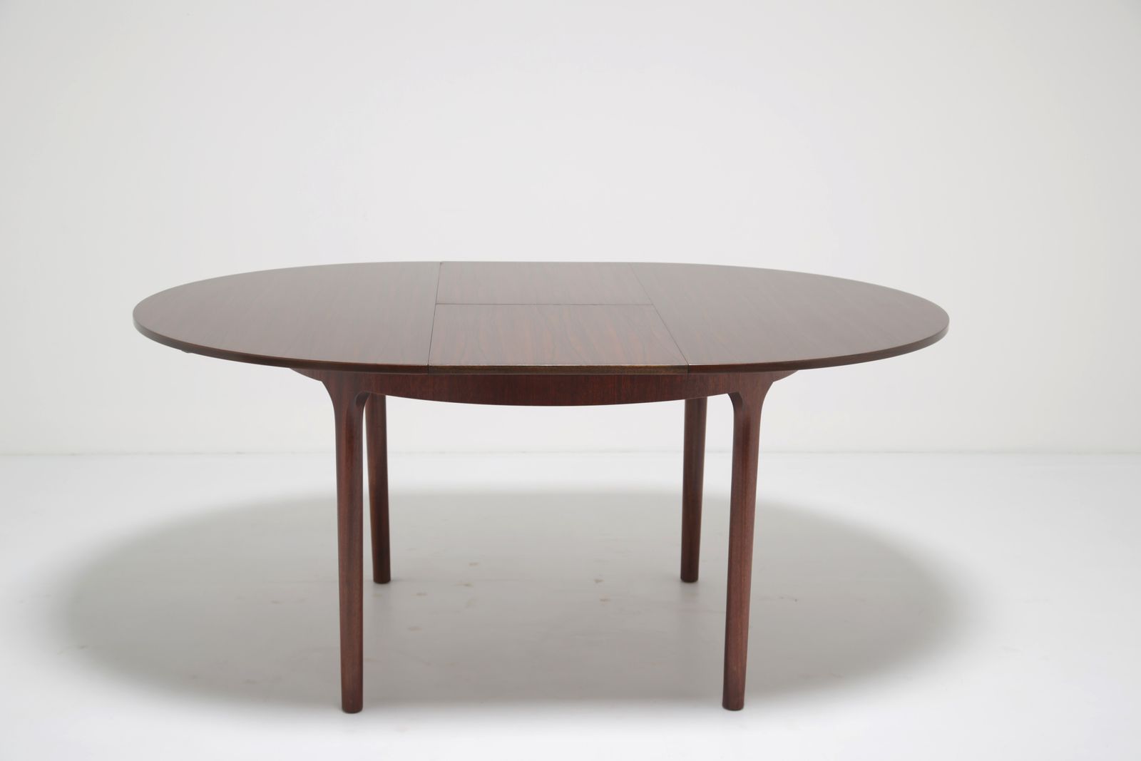 photo for sale Tom Robertson Circular To Oval Dining Table & Chairs ‘Dunvegan’ In Brazilian Rosewood For McIntosh, 1960s