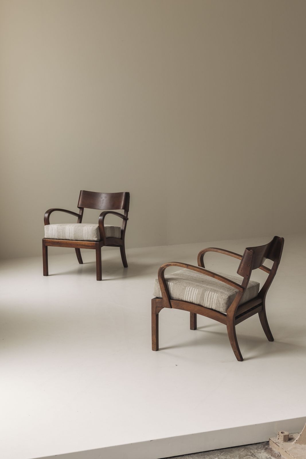 photo for sale Sculptural Pair Of Italian Easy Chairs In Walnut From The 1950s.