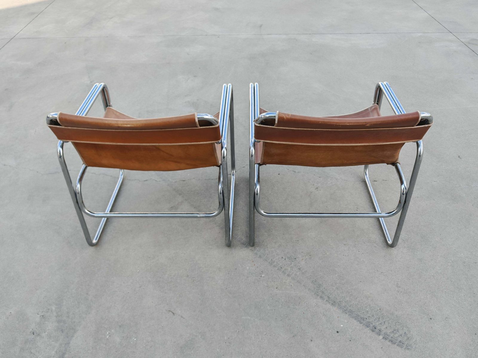 photo furniture Pair Of Bauhaus Style Tubular Lounge Chairs In Cognac Leather, Jox Interni 1970s