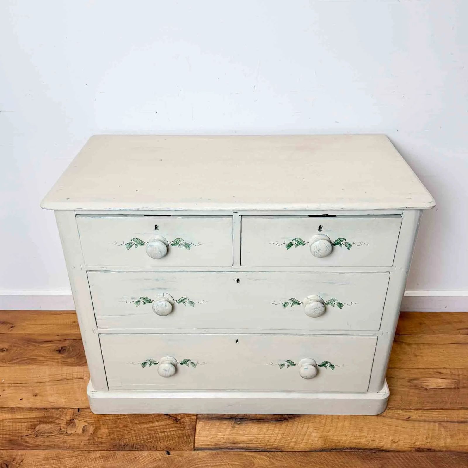 Painted Antique Pine Chest Of Drawers With Leaf Decoration photo furniture