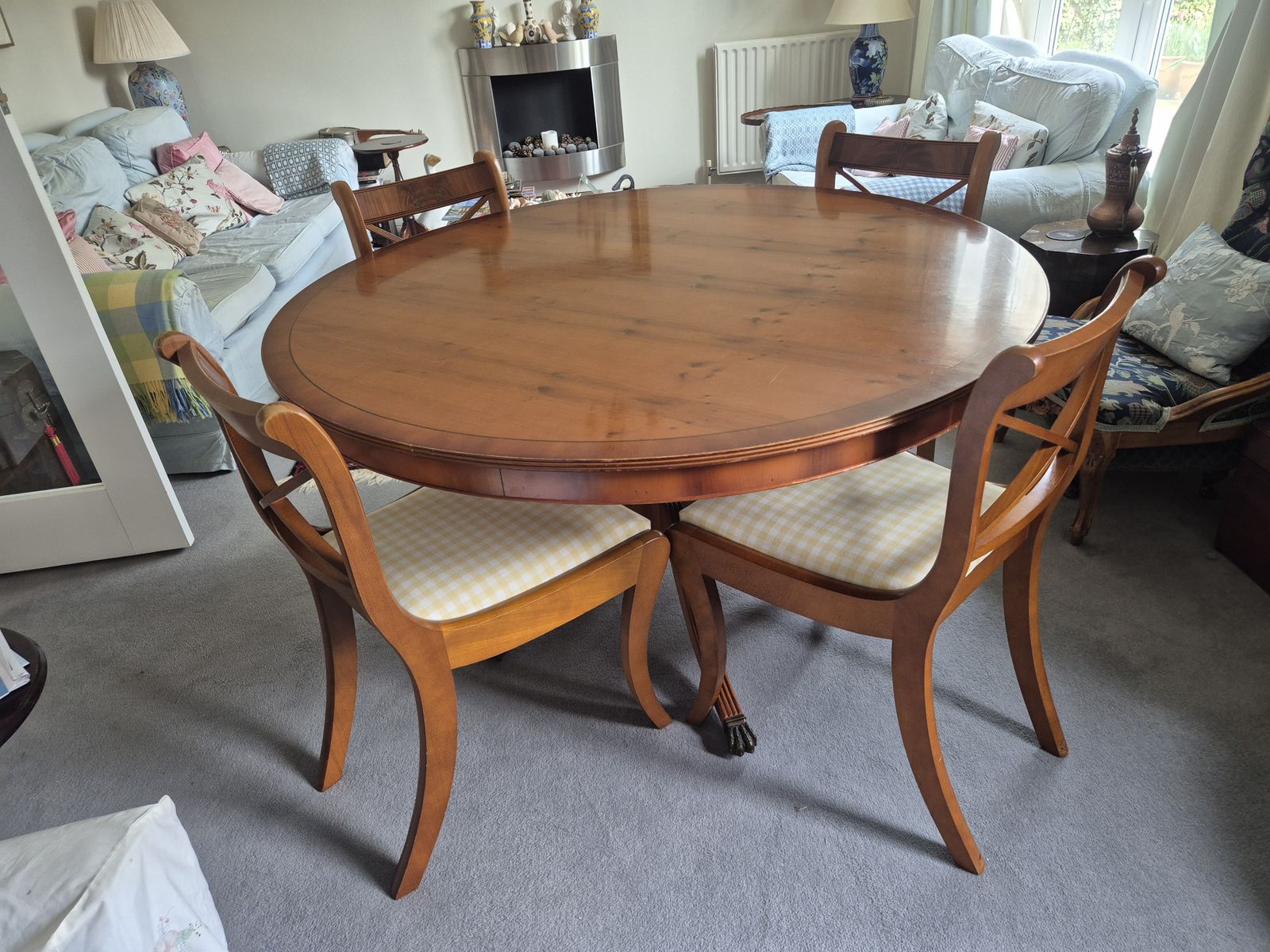 Lexterten Round Dining Table And Four Chairs photo furniture