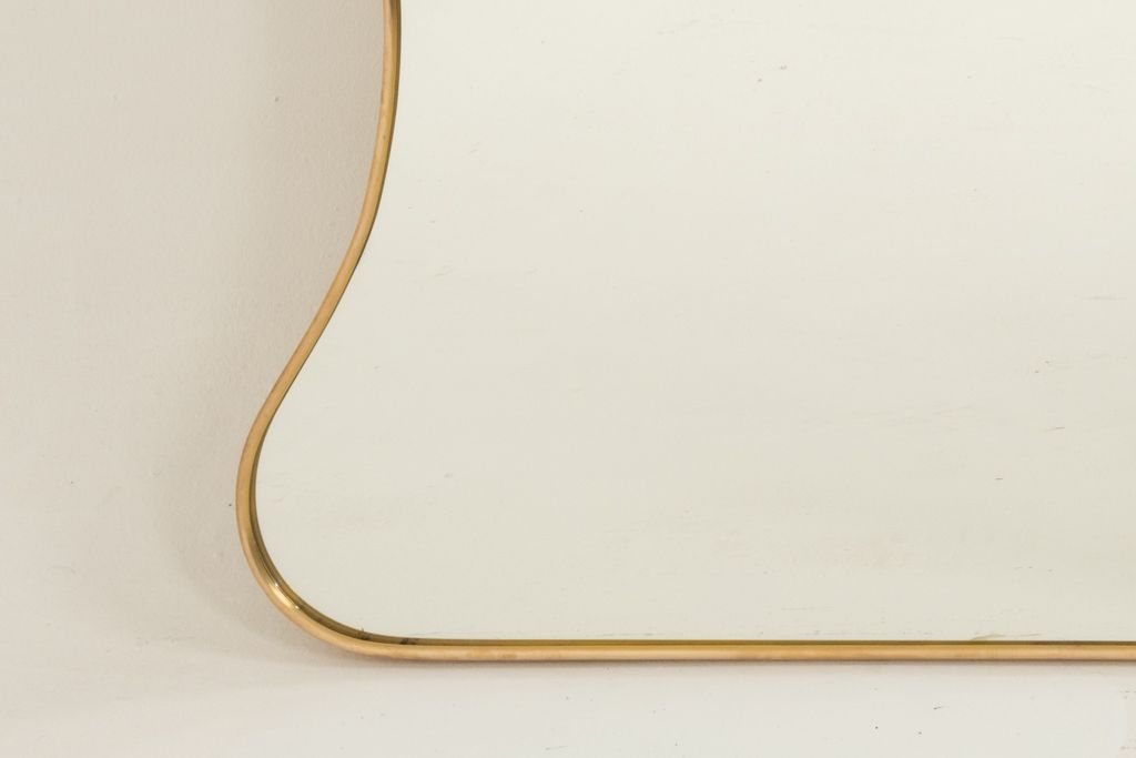Mirror In Brass And In The Style Of Gio Ponti And The 1980s. photo Home Decor