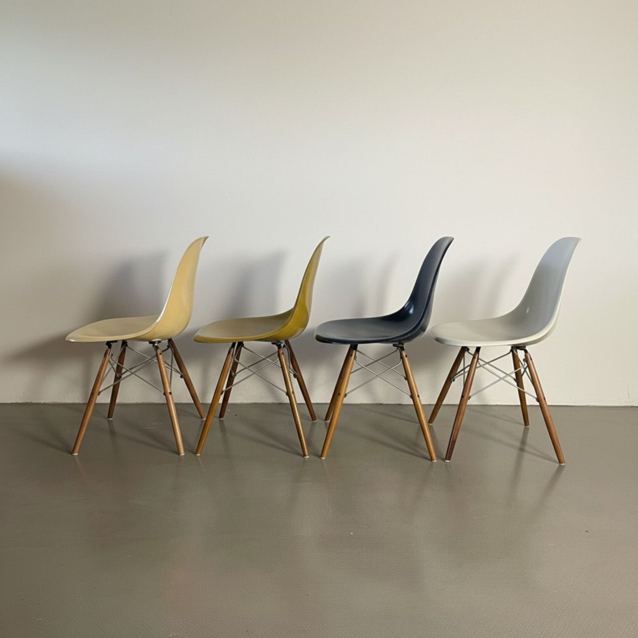 Eames Herman Miller Dsw Side Chairs In Parchment, Navy Blue, Light Olive And Light Ochre With Slight Imperfections photo vinterior