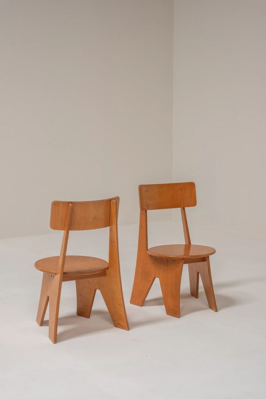 photo furniture Sculptural Pair Of Plywood Chairs, Germany, 1970s