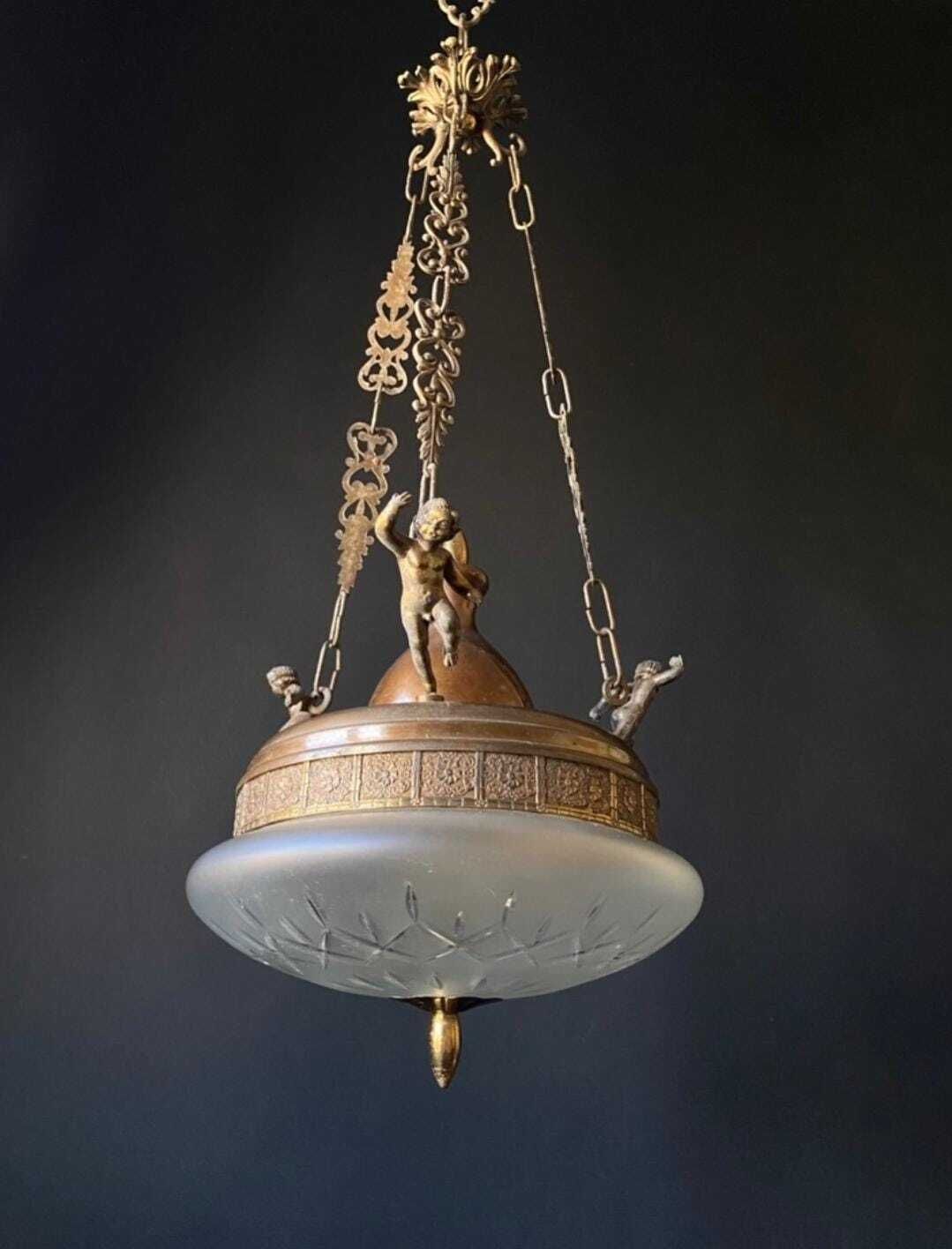 Duty Free USA. Antique Brass And Glass Chandelier From Italy With Cherubs photo vinterior