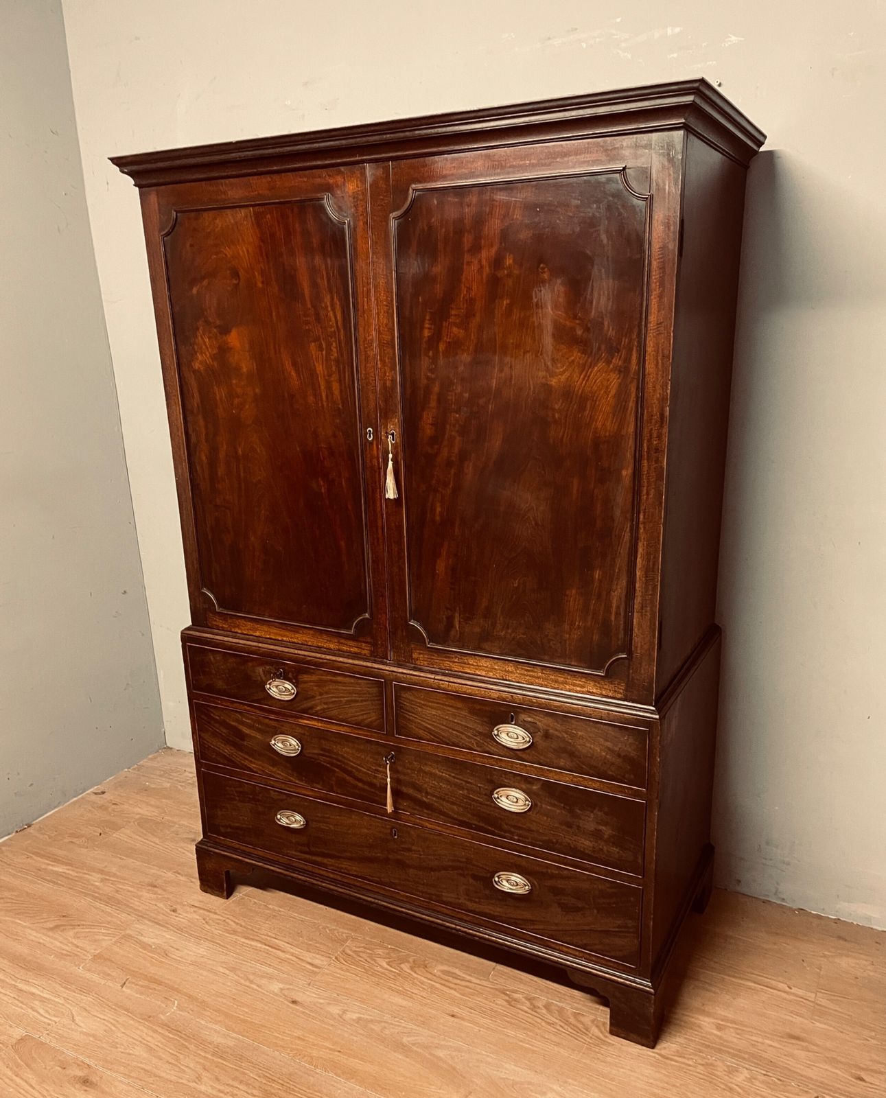 Furniture Georgian Flame Mahogany Linen Press Of Small Proportions photo