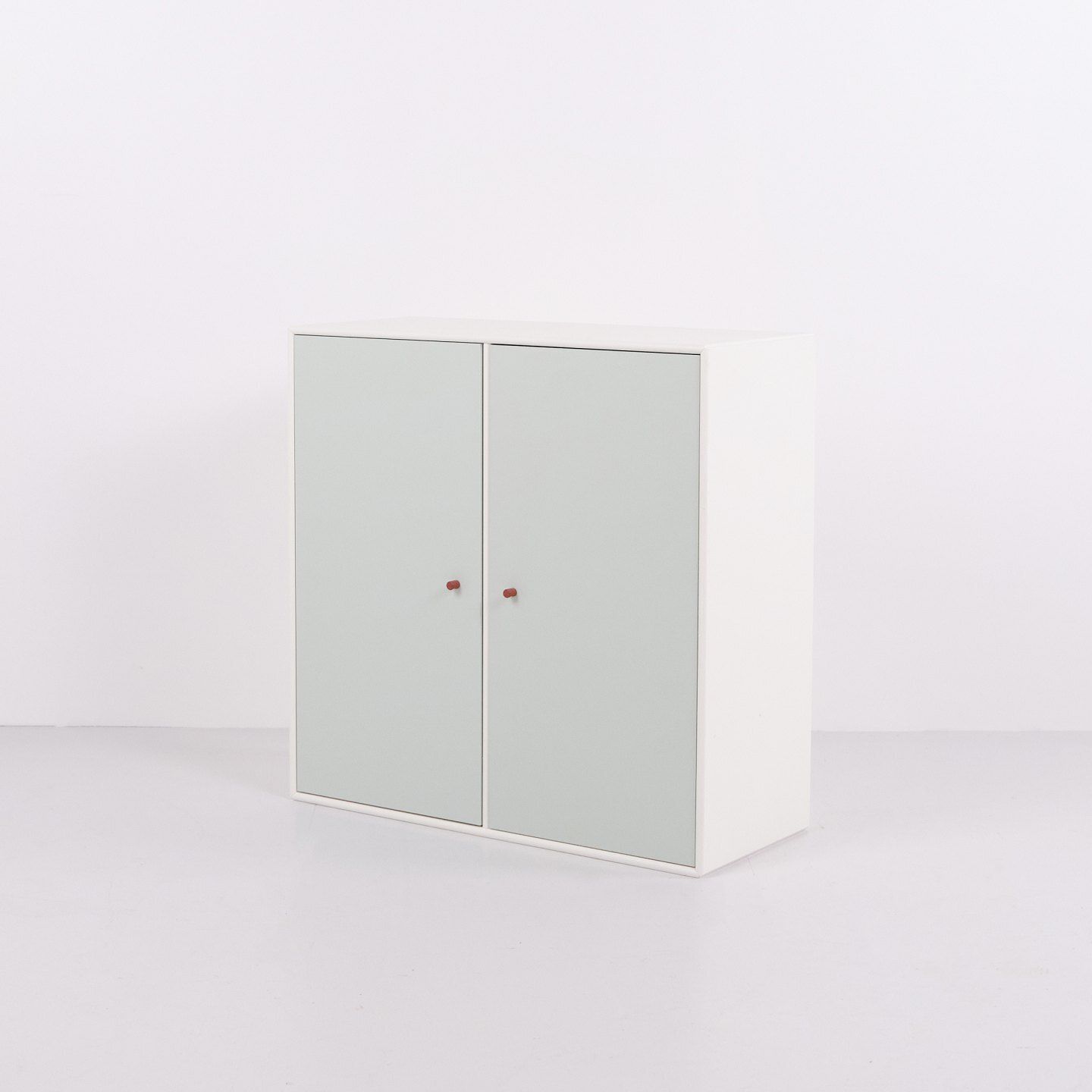 Montana Cabinet Module Model 1118 With Mint Green Doors And Brown Handles By Peter J. Lassen, 2 Pieces In Stock. photo furniture