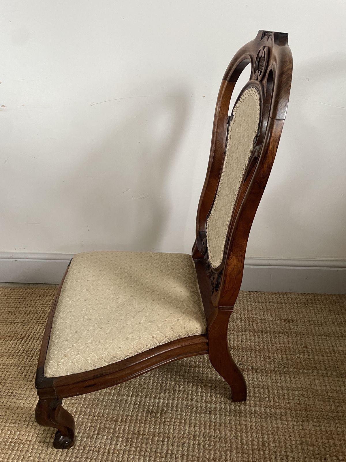 An Antique Carved Nursing Chair photo for sale