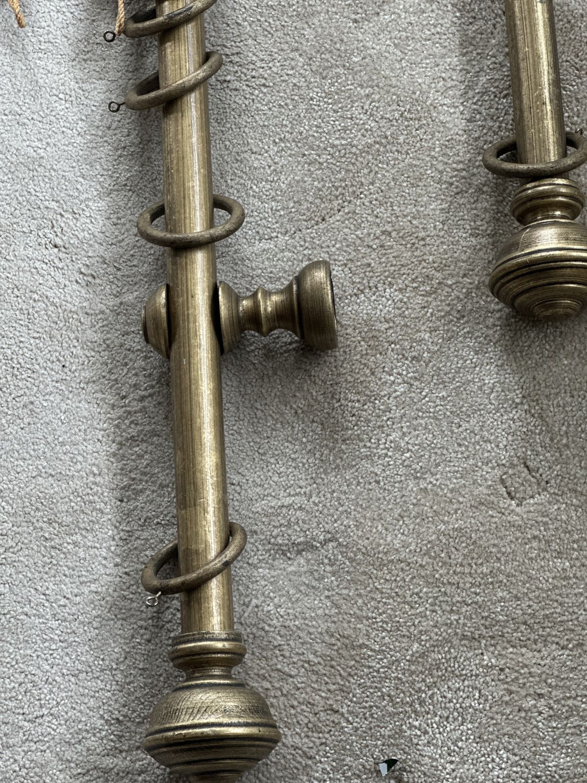 photo furniture Wooden Curtain Poles. Antiqued Brass Finish.