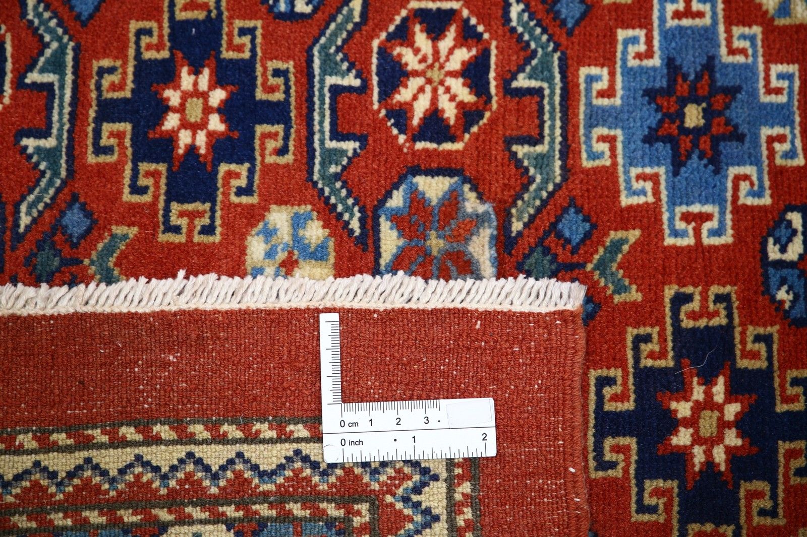 Tapis à motifs géométriques tribaux noué à la main, en rouge rouille, bleu marine et beige, 2,27 x 3,08 m photo buy
