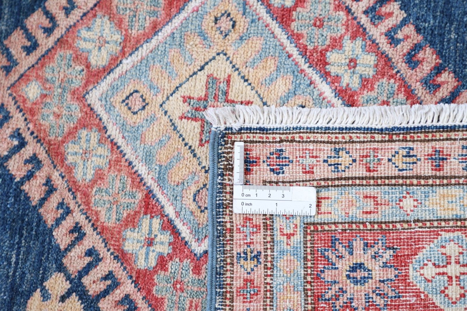 Tapis en laine noué à la main, bleu marine, rouge et ivoire, à motif géométrique - 1,07 x 1,94 m photo 1104.0