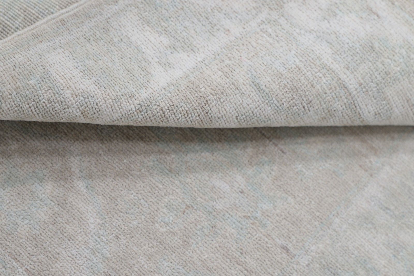 2x3 ft traditioneel beige Turks vloerkleed. Decoratief handgeknoopt wollen vloerkleed photo Textiel