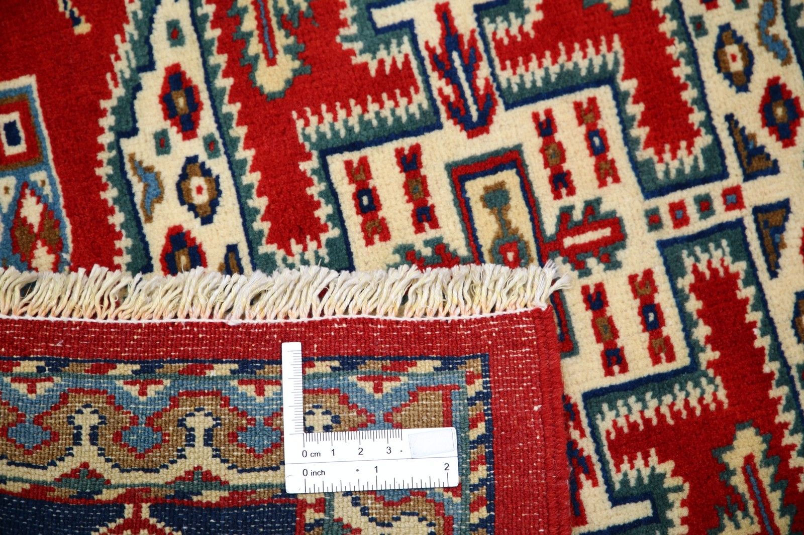 Tapis artisanal rouge, bleu marine et beige, 67 x 79 cm - motif géométrique tribal à médaillon photo buy