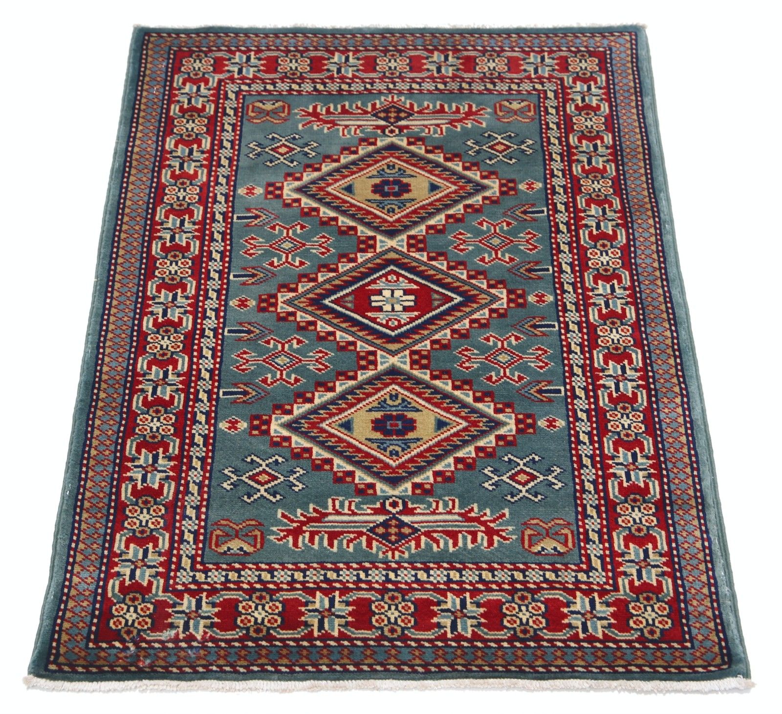 Handgeknoopt vloerkleed, blauw, rood en ivoor, met geometrisch medaillonmotief, 64 x 89 cm photo Textiel