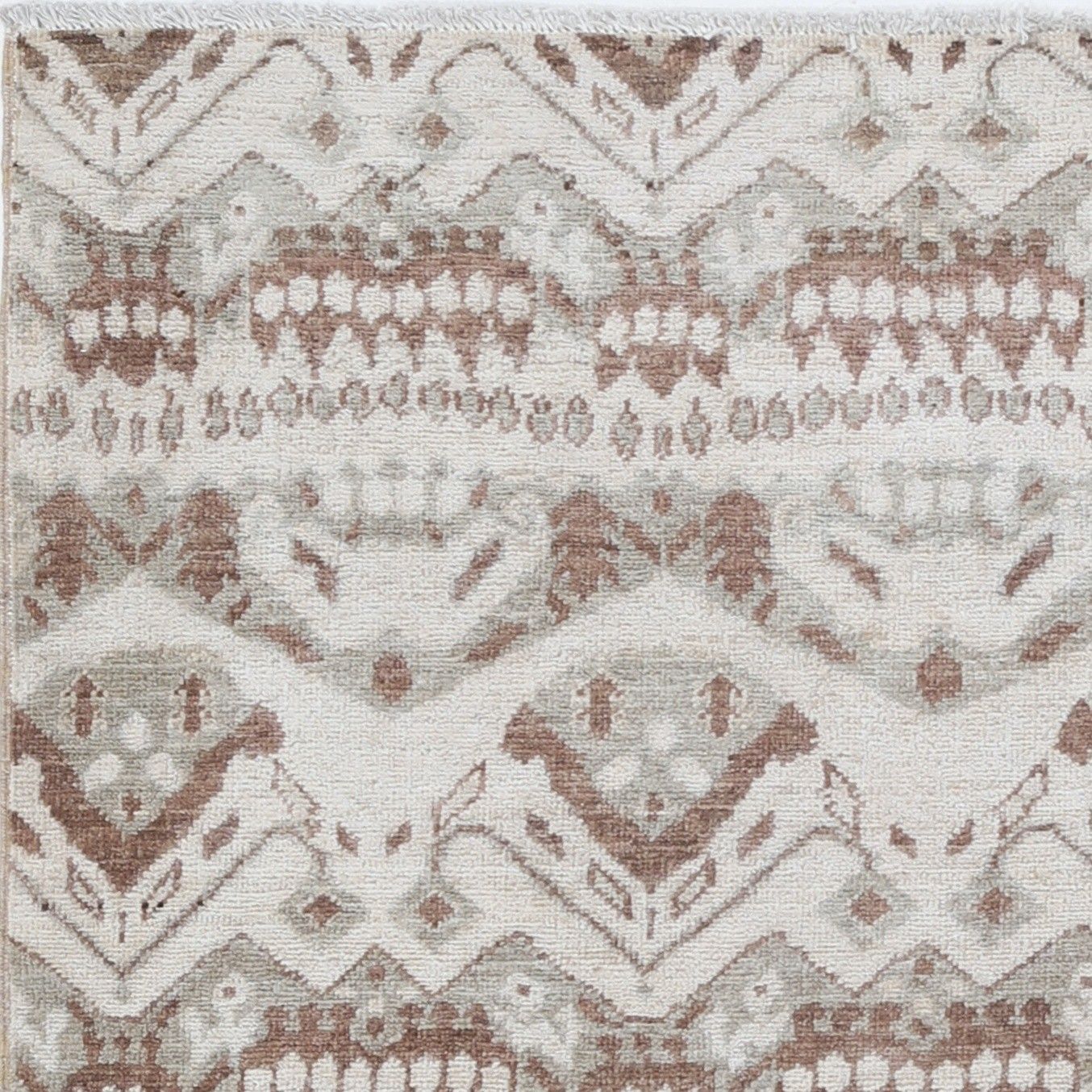 3x3,3 ft handgeknoopt wollen vloerkleed in ivoor en bruin. Accent rug met geometrisch dessin photo vinterior