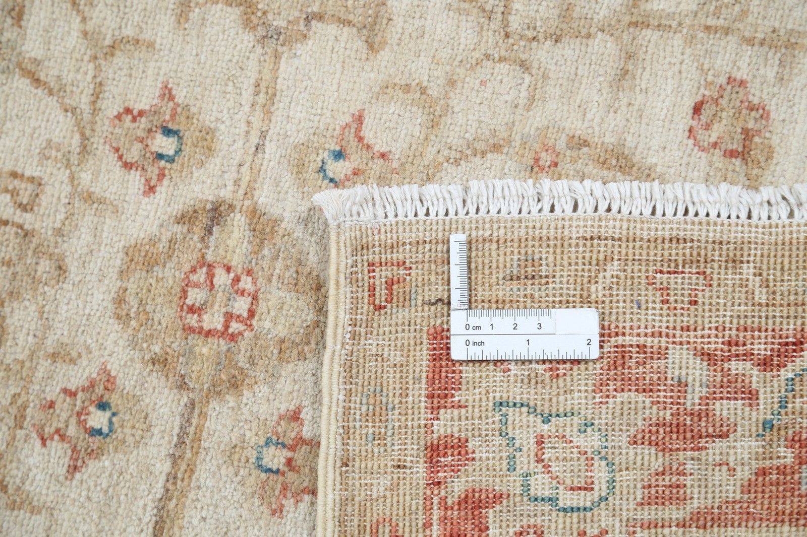 Tapis d'appoint noué à la main beige à bordure rouge, motif floral en laine, 84 x 120 cm photo buy