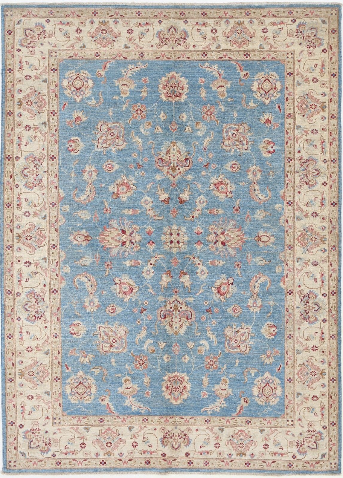 Tapis Oushak floral noué à la main, 150 x 209 cm, fond bleu et bordure beige. 100 % laine
