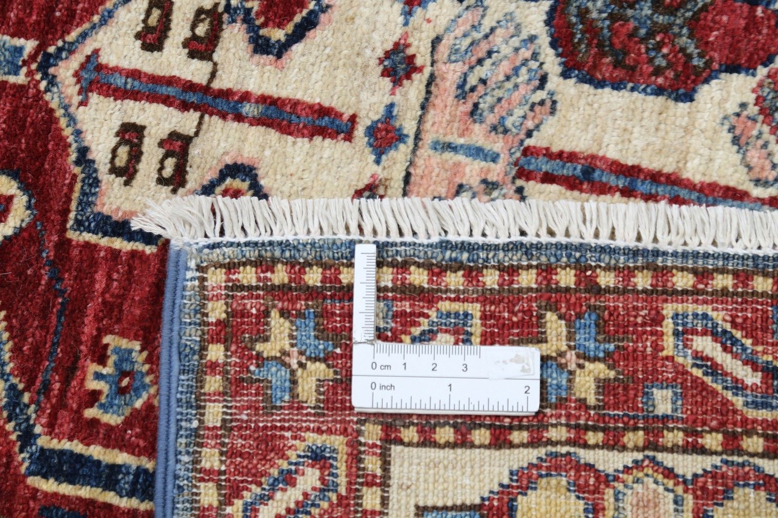 Tapis noué main rouge, bleu marine et ivoire à motif géométrique, 176 x 234 cm photo buy