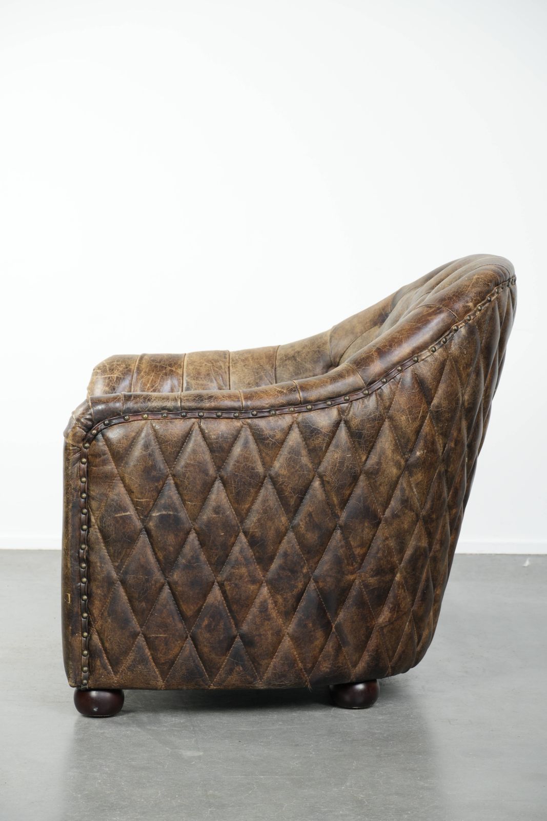 Unique, Stylish, And Comfortable Cowhide Chesterfield Club Armchair With A Beautiful Color Combination. photo 1042.0