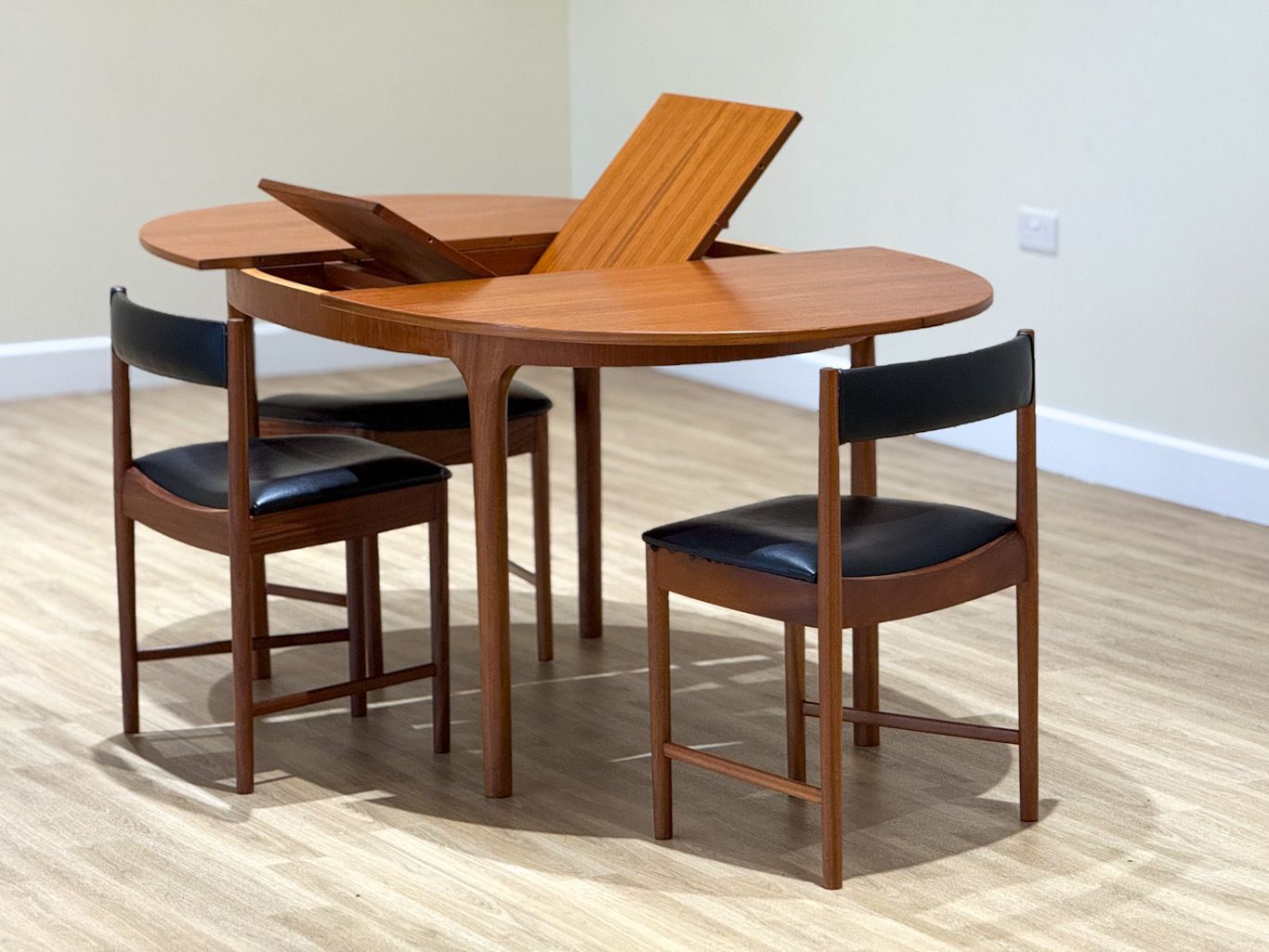 photo furniture A McIntosh Extending Oval Dining Set By Tom Robertson — Dunvegan Collection, 1960s