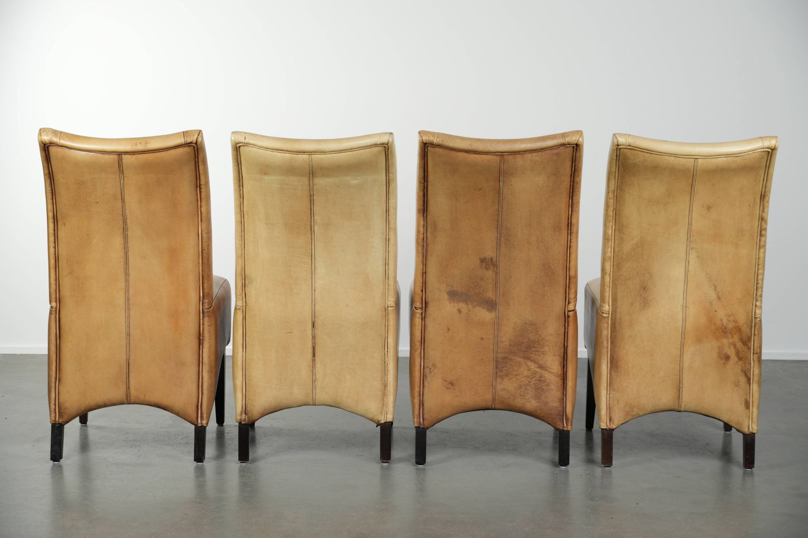 Luxury Set Of Four Cowhide Leather Dining Chairs With A Beautiful Light Color, Comfortable Seat, And A High Back photo Furniture