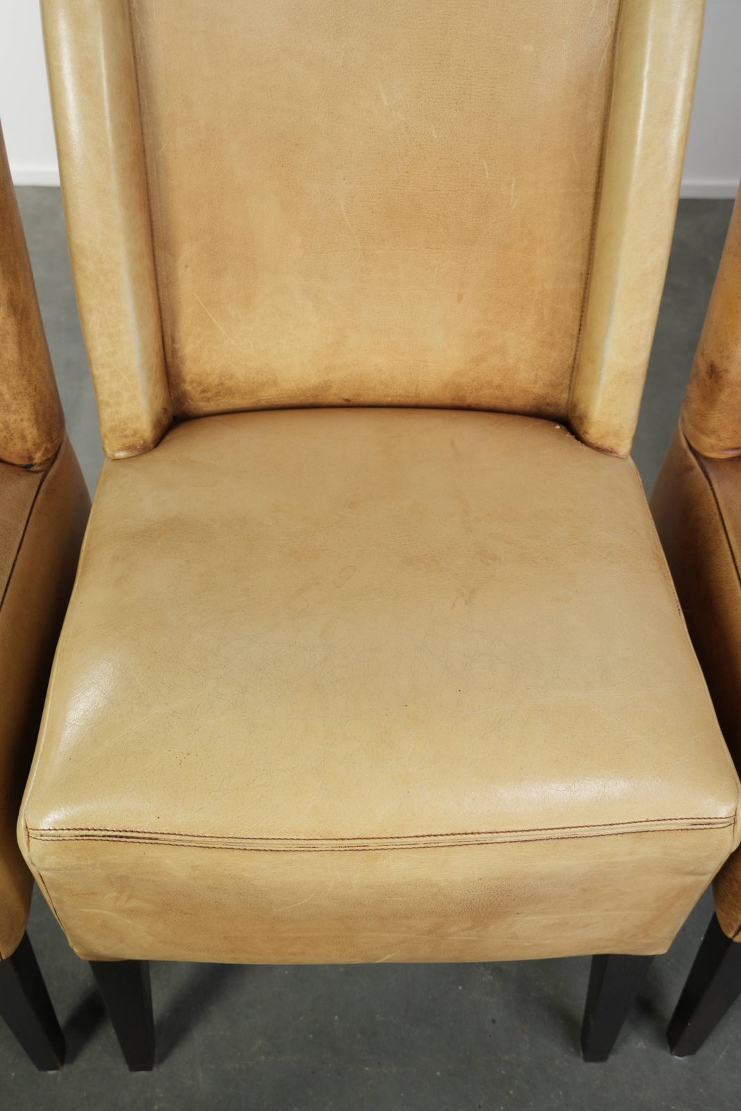 Luxury Set Of Four Cowhide Leather Dining Chairs With A Beautiful Light Color, Comfortable Seat, And A High Back photo buy