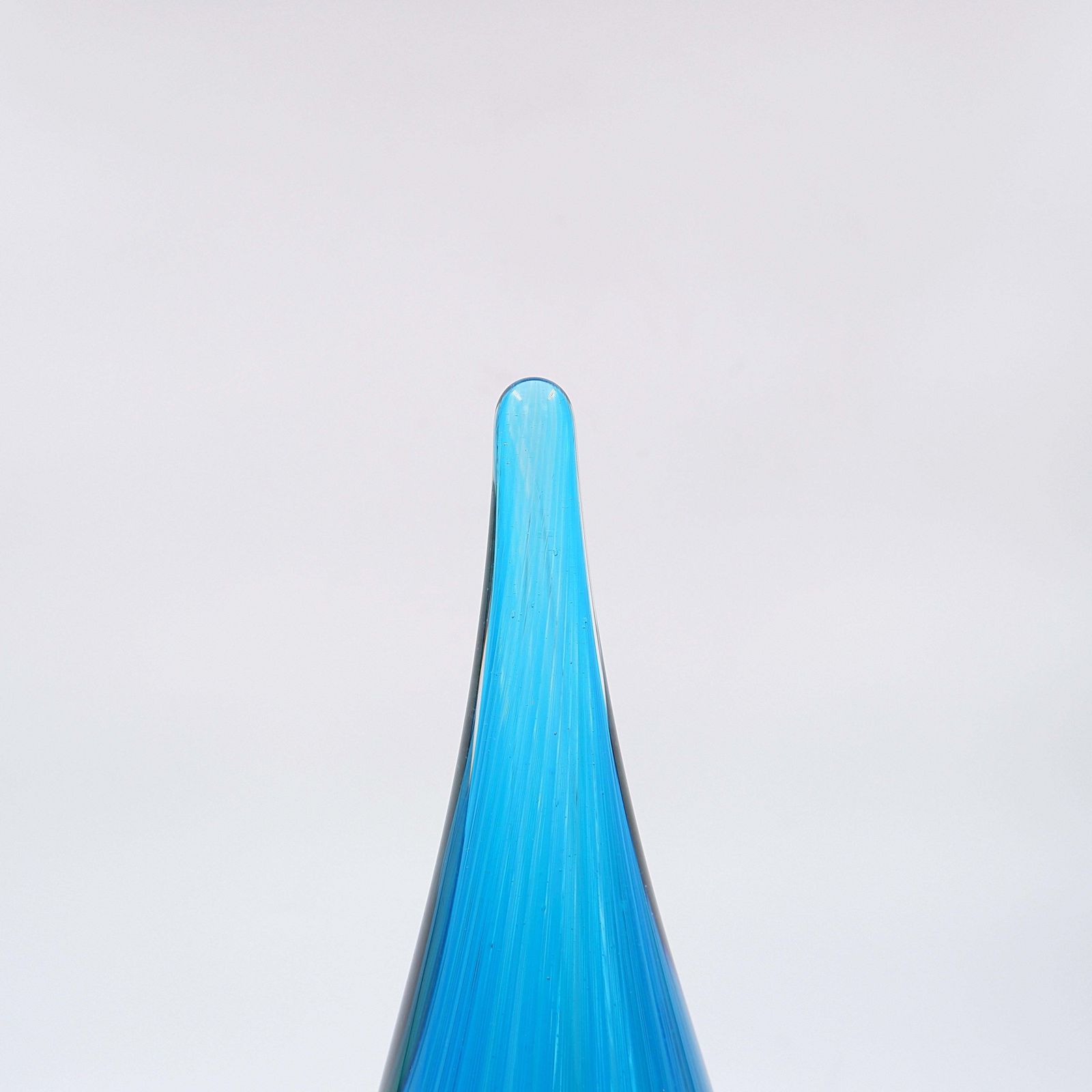 Art Glass Sculpture In The Shape Of A Teardrop In Shades Of Blue And Green photo for sale