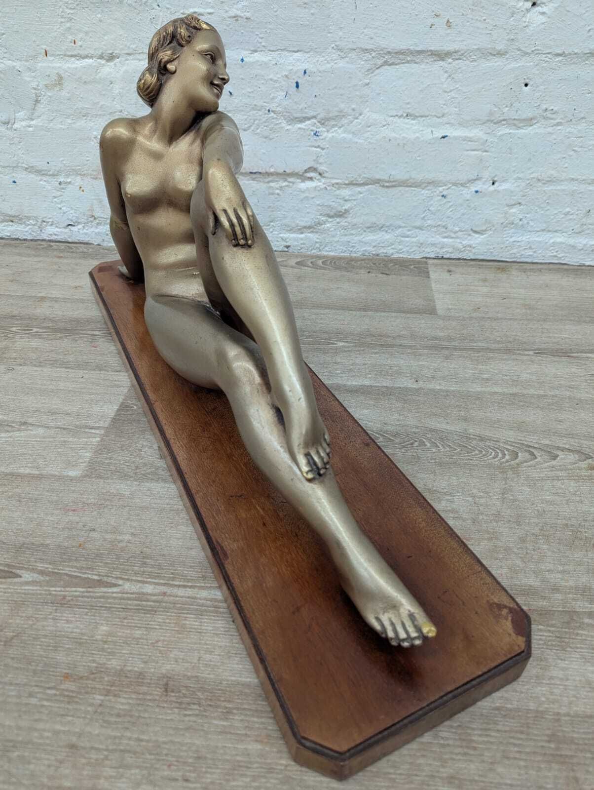 Early 20th Century French Art Deco Reclining Nude Figure On Wooden Plinth photo for sale