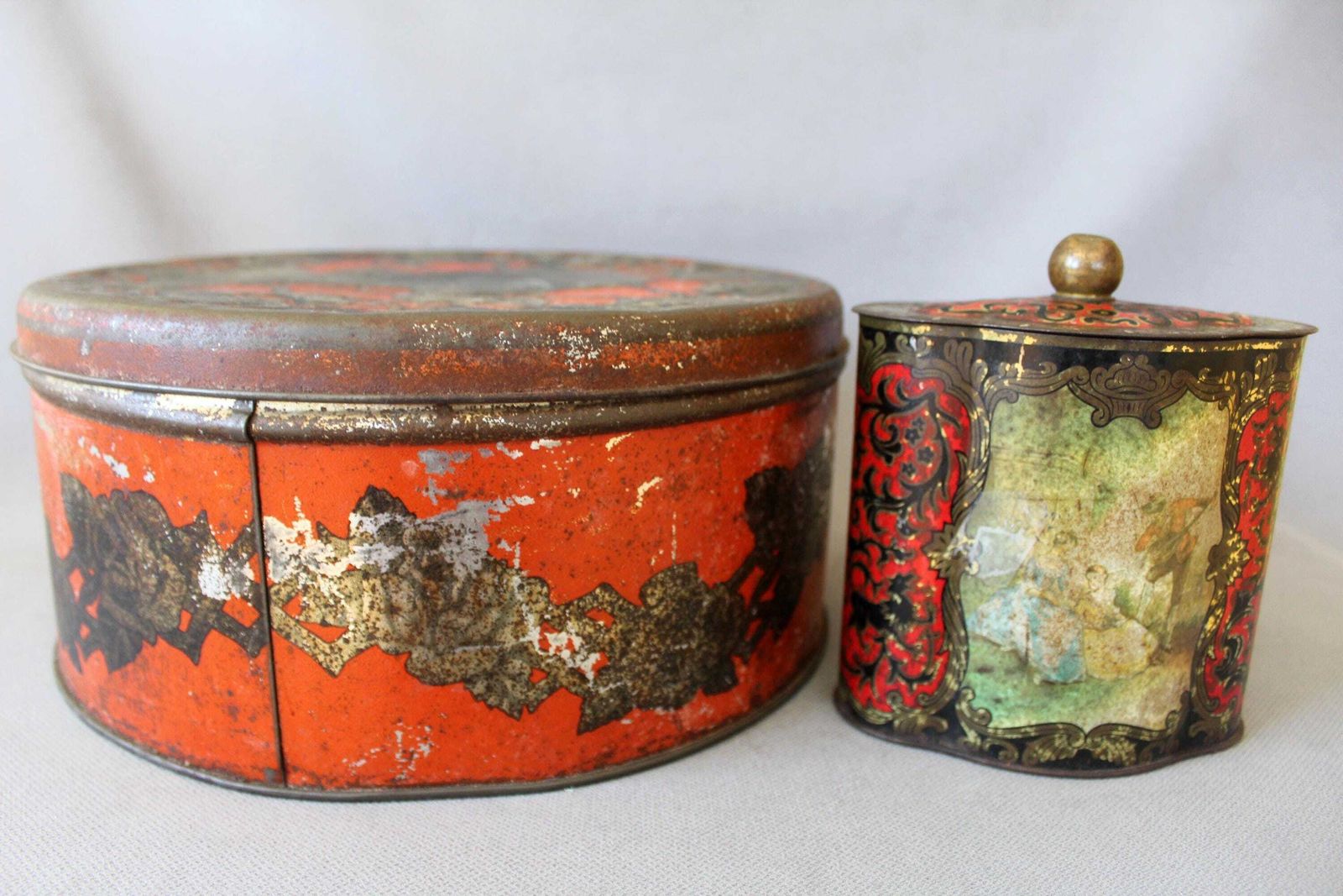 Home Decor Two Collectable Tin Metal Boxes, One Very Large Round Art Nouveau Antique From Belgium, Vintage Western Germany, Red, Embossed photo