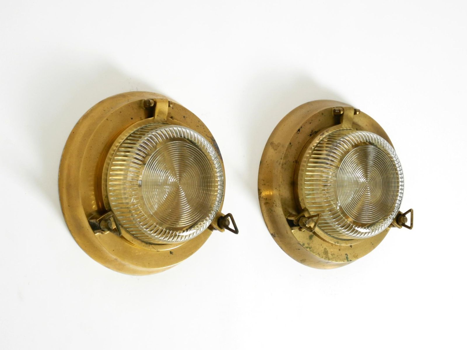 A Pair Of Large, Heavy 1950s Maritime Ship Wall Lamps Made Of Brass And Glass photo for sale