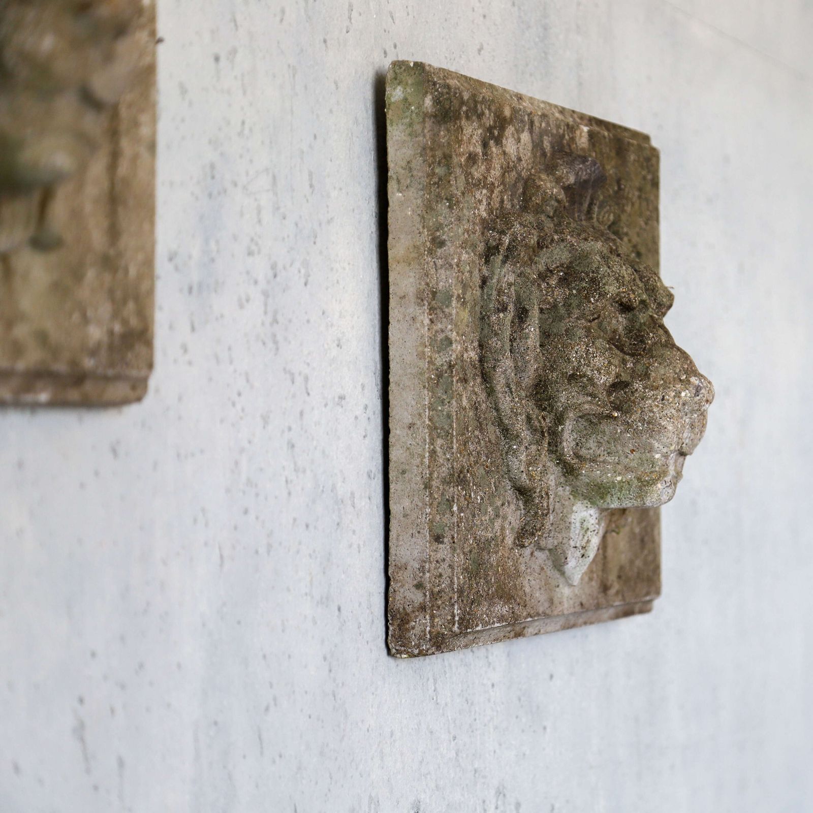 photo for sale Pair Of Composite Stone Lion Masks With Weathered Patina, Classical Style, C.1960s